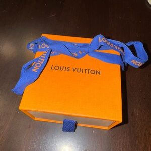 Louis Vuitton Bright Orange Box with Bold Blue Ribbon